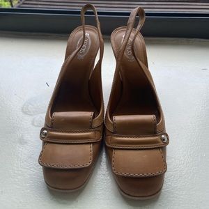 Authentic Tan Leather Tod's Heels and wooden heel.